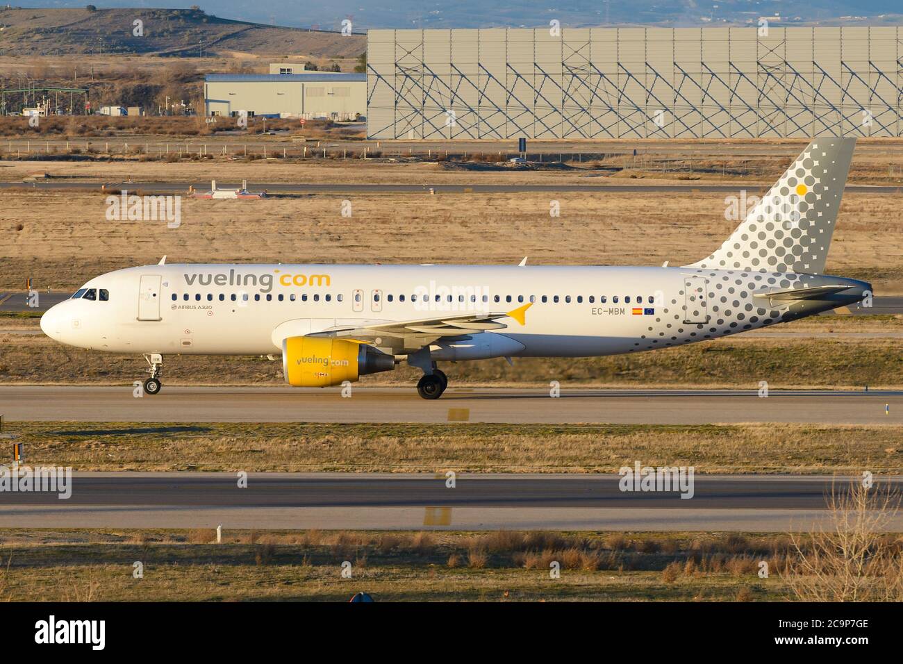 Vueling Airlines A320 taxiing at Madrid Barajas Airport in Spain. Aircraft A320 EC-MBM. Spanish low cost airline. Stock Photo