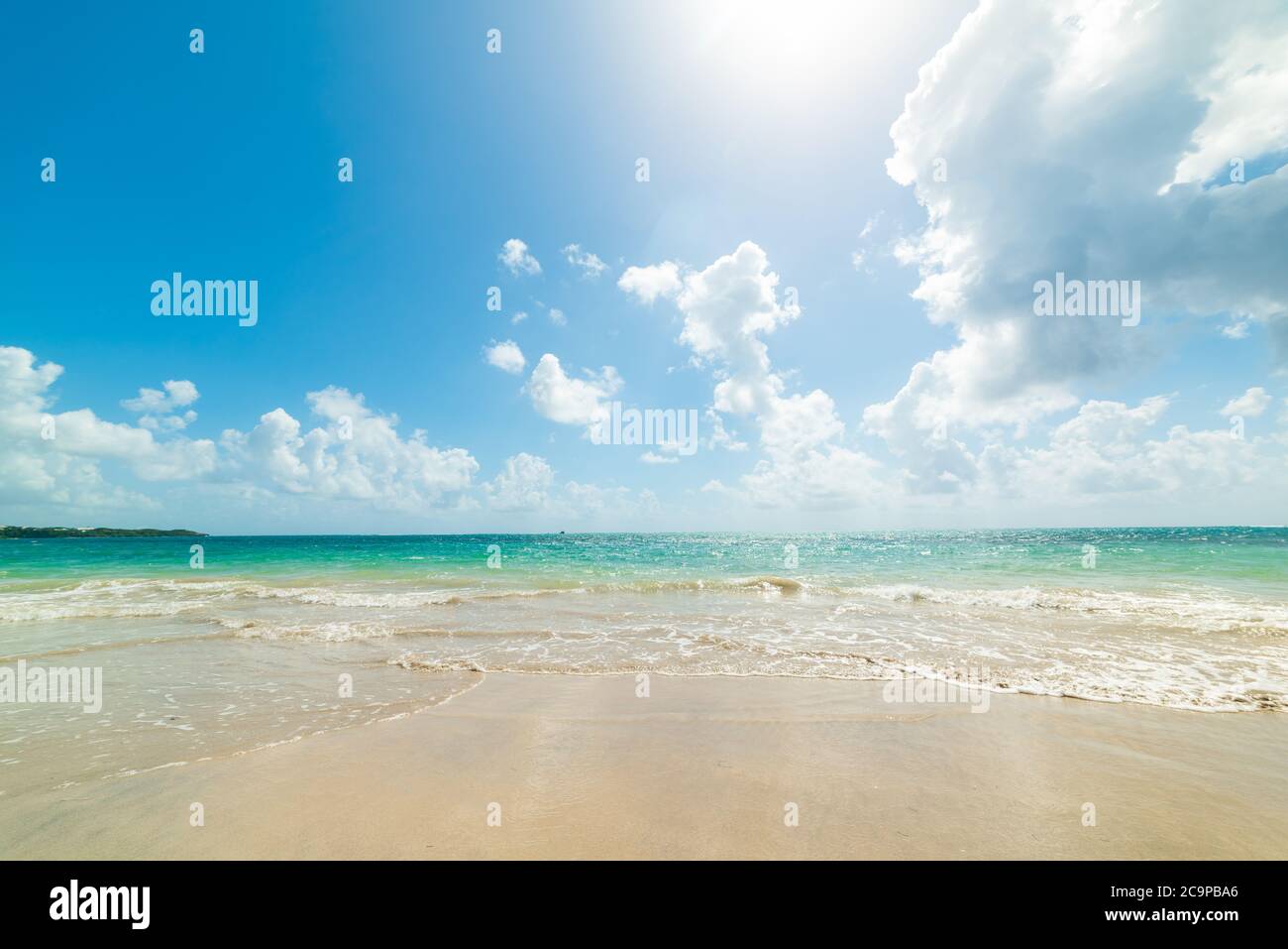 Cloudy sky over Pointe de la Saline beach in Guadeloupe. Lesser