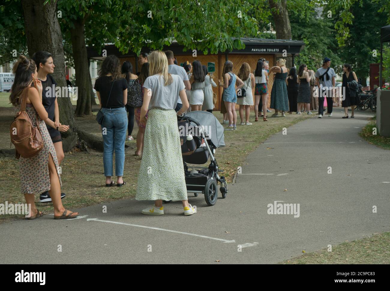 Women queue toilet hi-res stock photography and images - Alamy