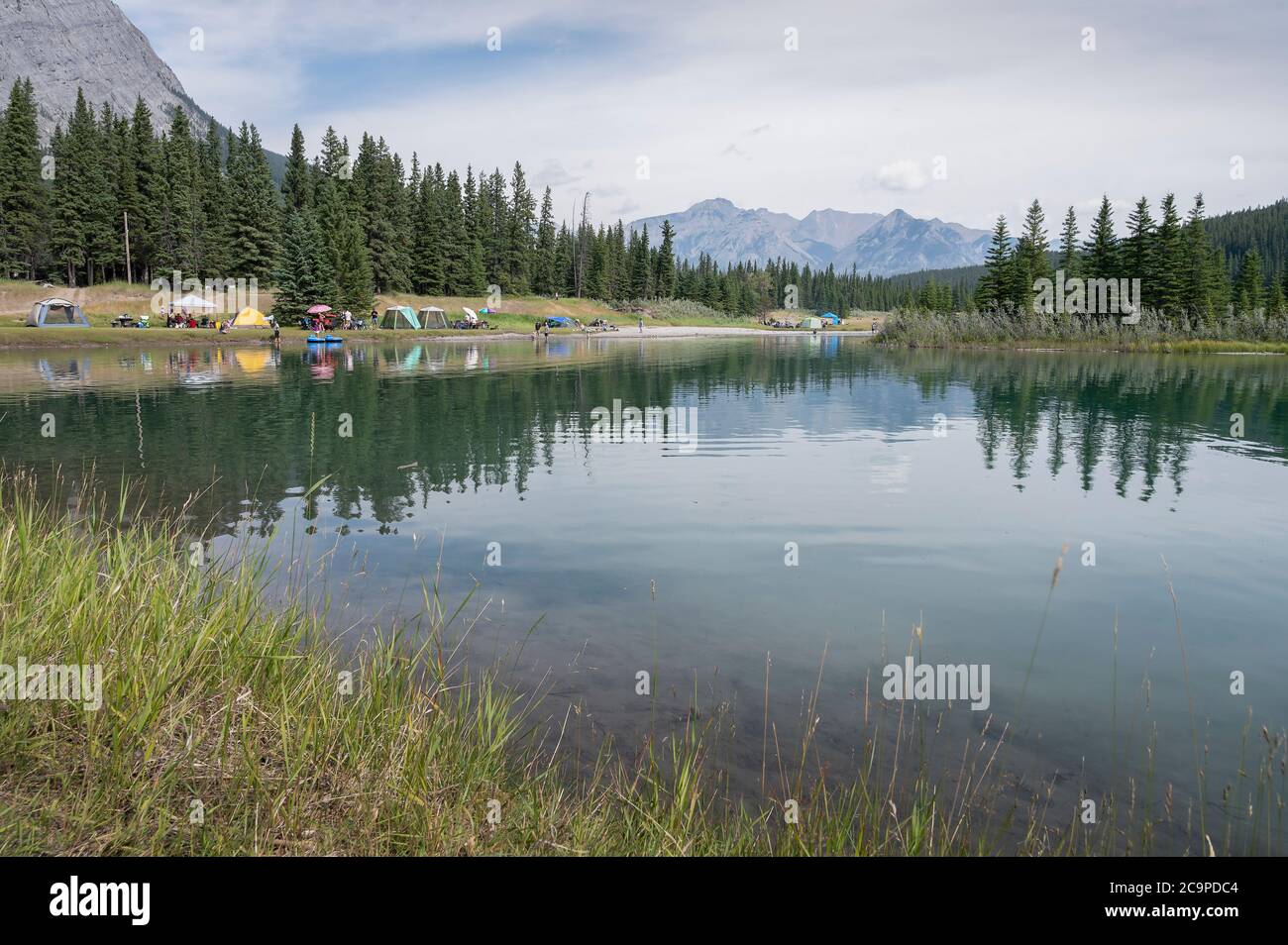 People at Cascade Pond in Banff National Park on the Heritage Long ...