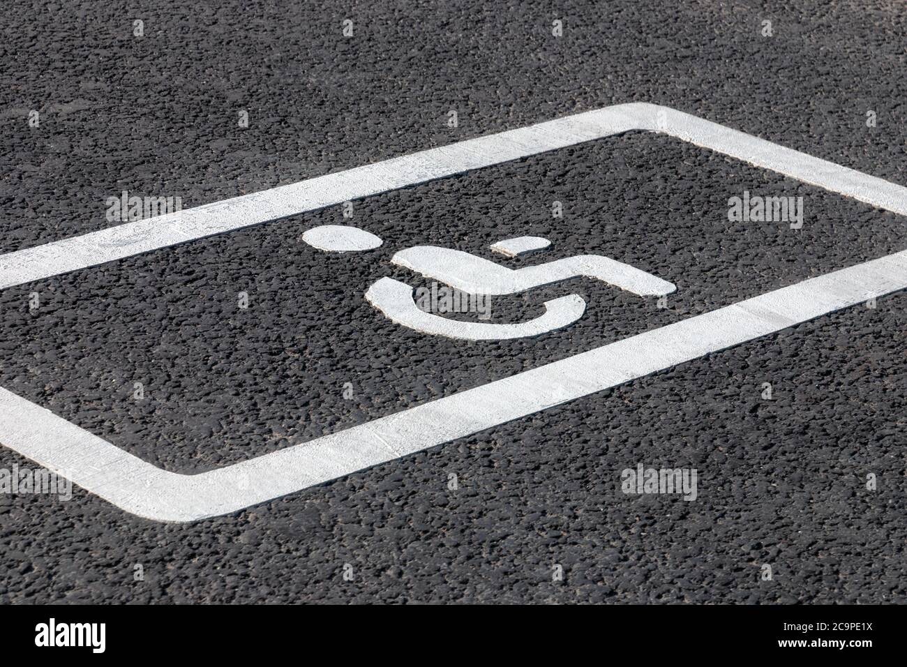 parking spot for disabled drivers, road marking on asphalt road Stock