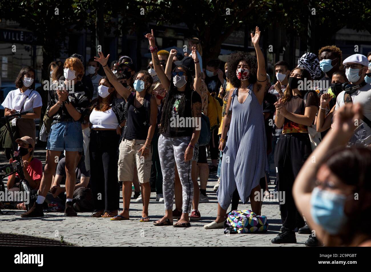 Protesters raise their hands during the demonstration.Hundreds of Black lives Mater protesters took over the streets to demand justice for Bruno Cande, a Black actor who was shot dead by a white man on a busy street last weekend. Stock Photo