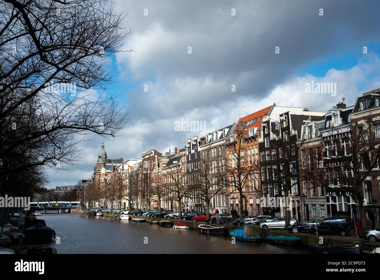 Stately houses line the banks of Prinsengrach, one of the principle canals in Amsterdam. Stock Photo