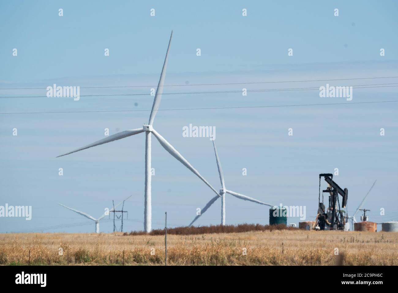Harrold, TX, USA. 31st July, 2020. The Harrold wind turbines spin as a