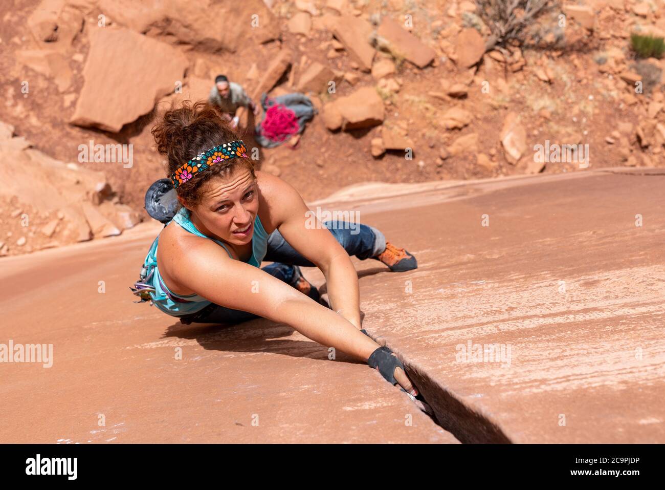 Woman Rock Climbing Stock Photo