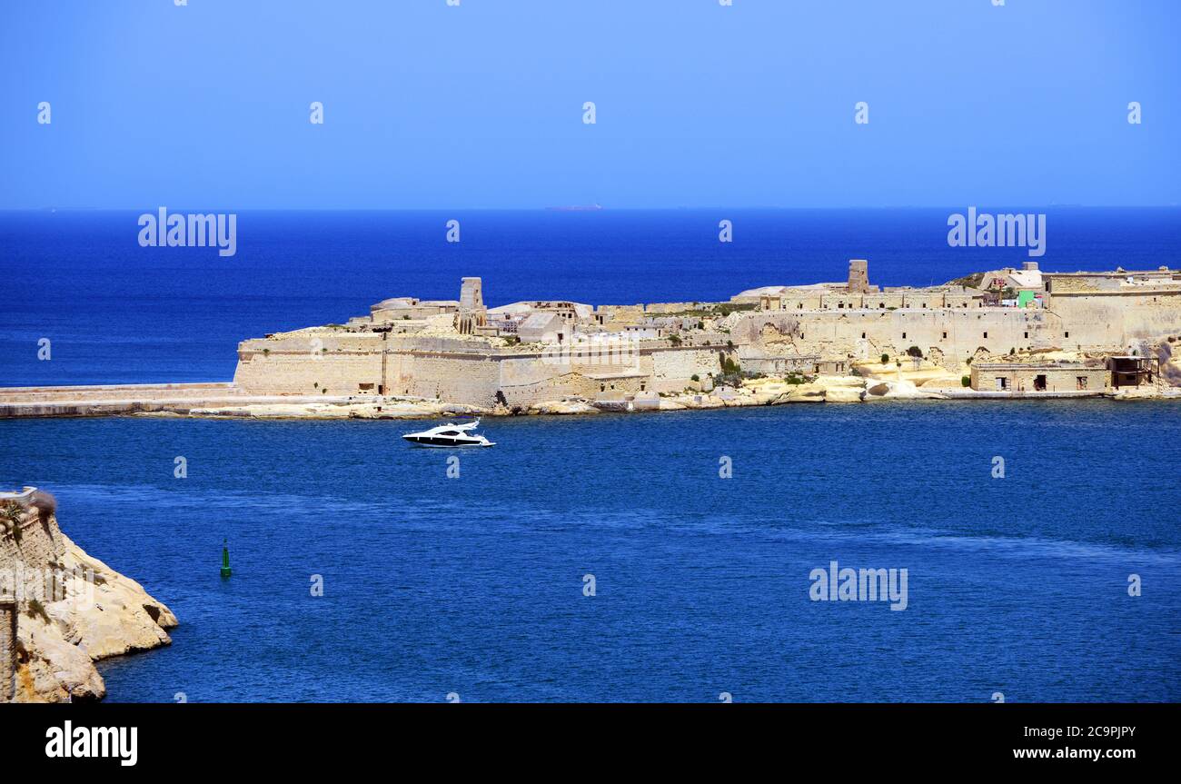 Fort Ricasoli at the entrance to the Grand Harbour near Valletta, Malta. Stock Photo