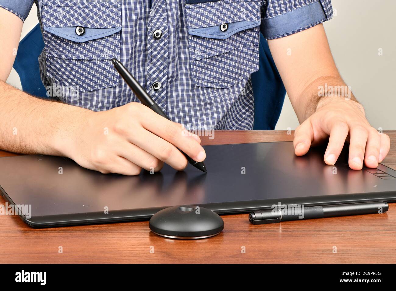 Man worked on professional graphics tablet. High resolution photo. Full