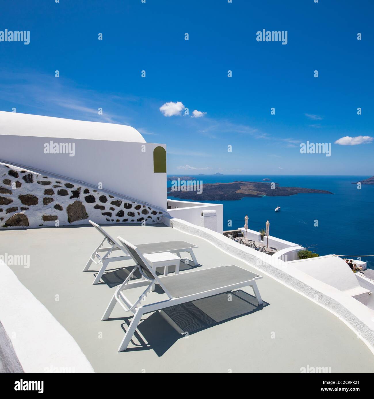 Deck chairs on the terrace with sea view. Luxury travel background ...