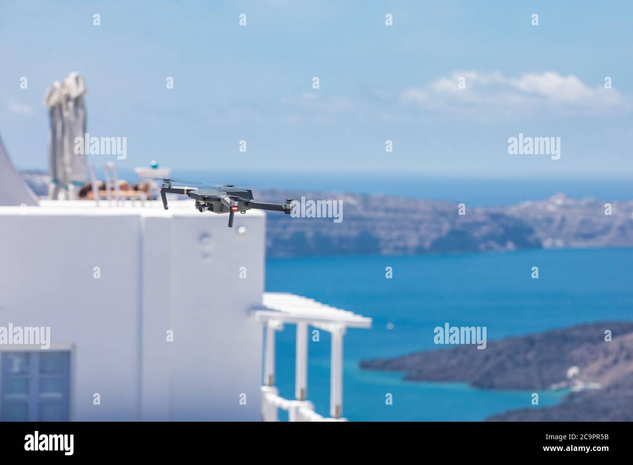 Drone with cityscape of Santorini. Stock Photo