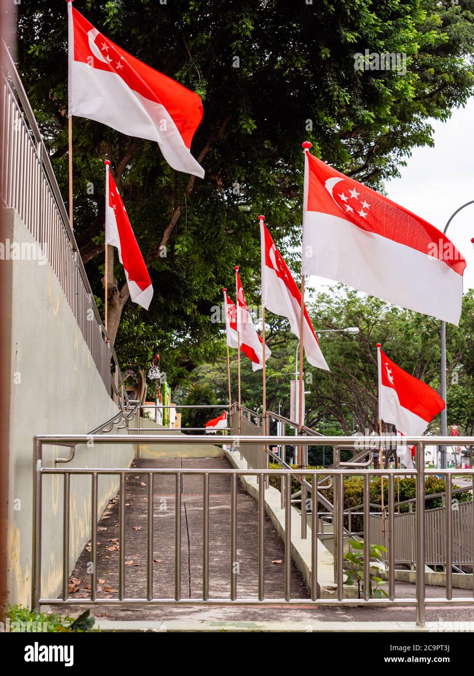 SINGAPORE – JUL 31, 2020 – Singapore national flags placed at Sin Ming HDB residential estate in preparation for National Day Stock Photo