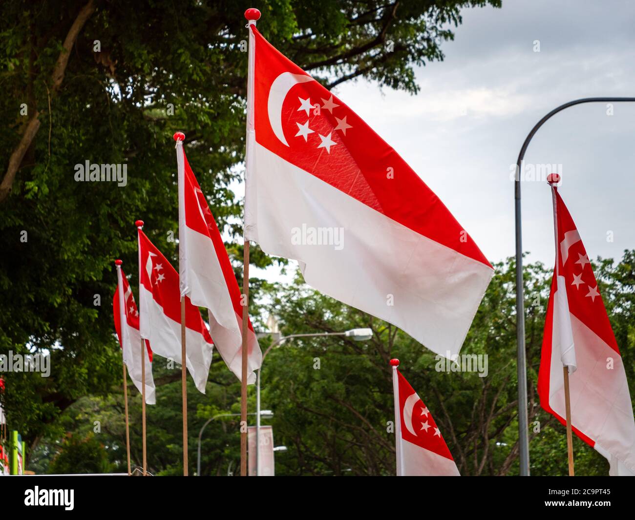 SINGAPORE – JUL 31, 2020 – Close up of Singapore national flags placed at Sin Ming HDB residential estate in preparation for National Day Stock Photo