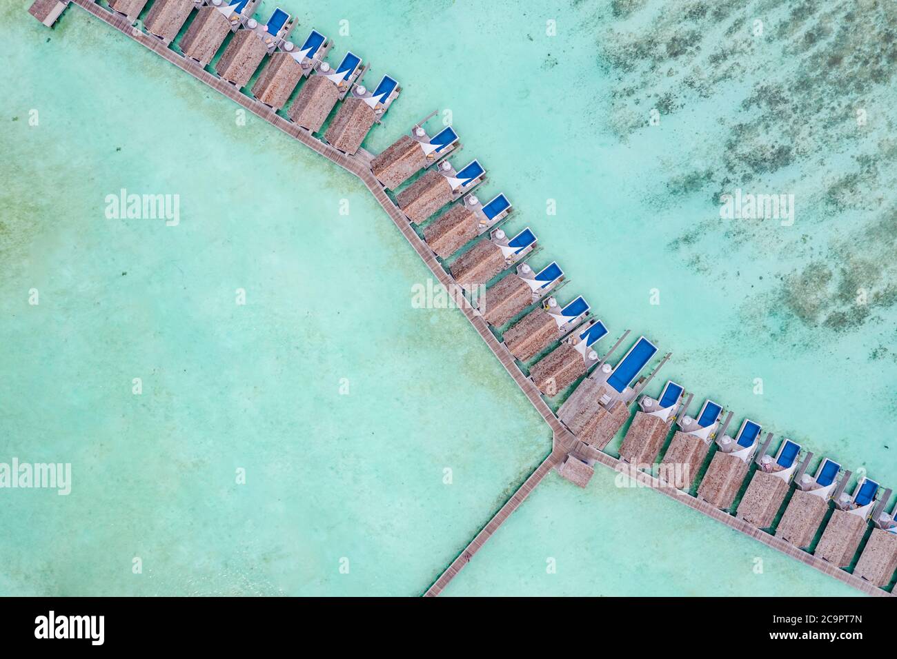 Amazing bird eyes view in Maldives, landscape seascape aerial view over a Maldives. Landscape, luxury tropical resort or hotel with water villas beach Stock Photo