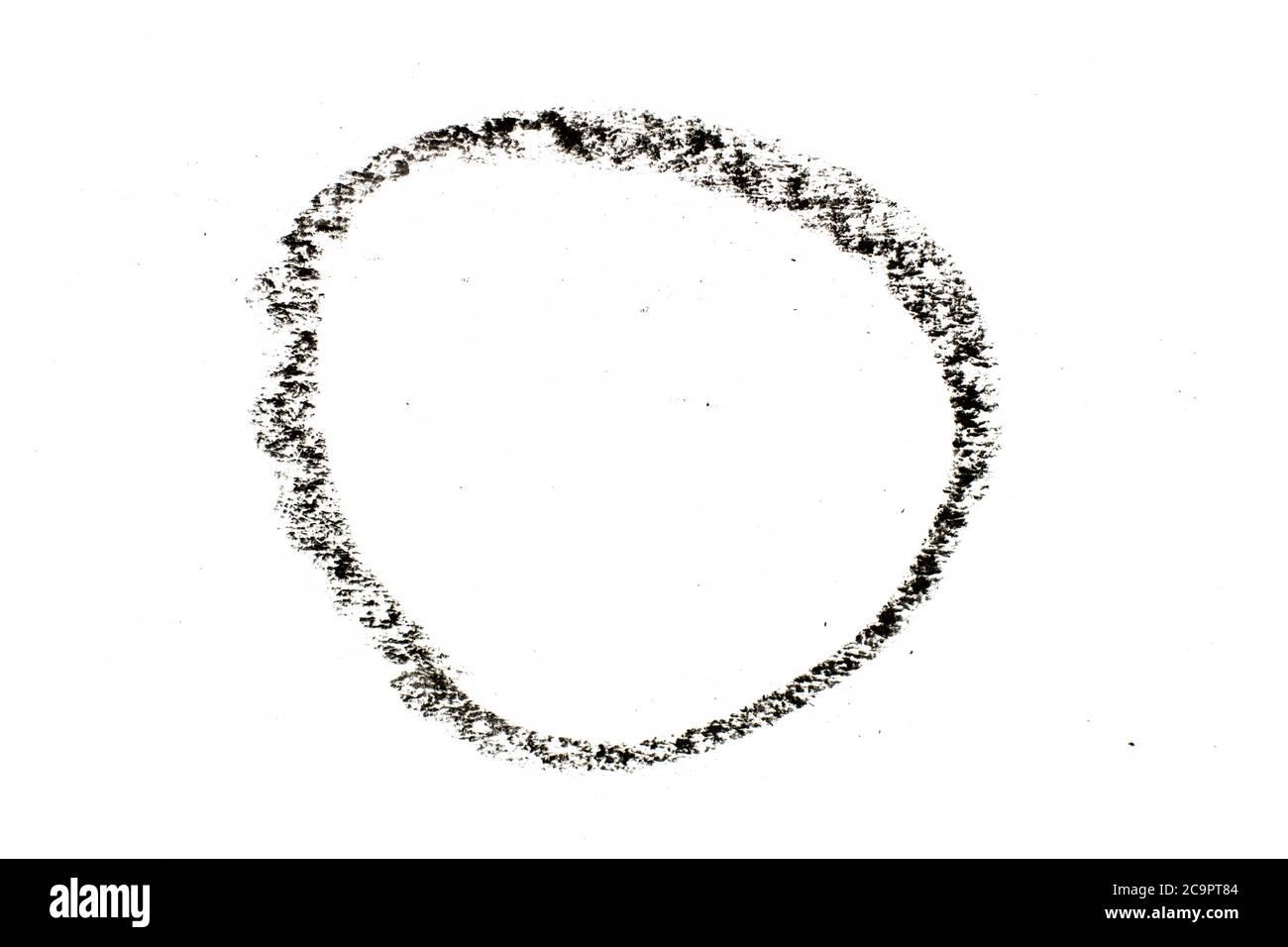 Black color oil pastel drawing in circle or round shape on white paper