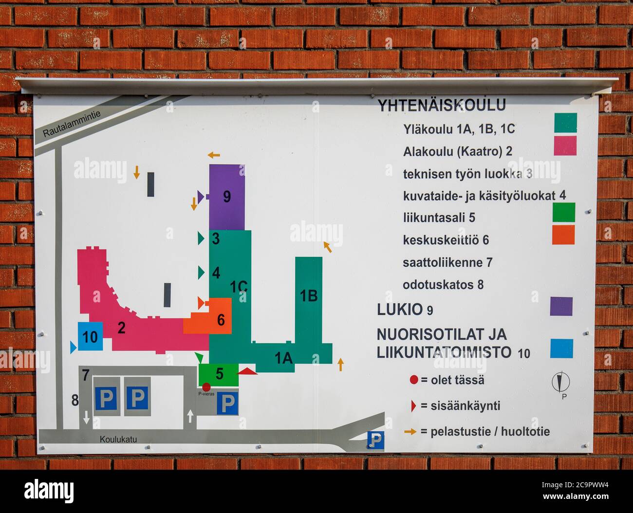 Closeup of floor map of a school  building ( in Finnish ) inserted to tile wall outside the school building , Finland Stock Photo