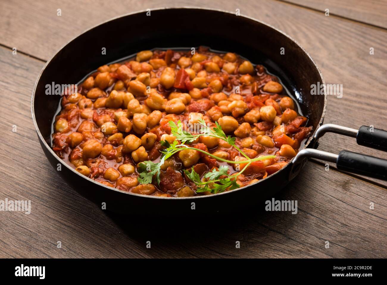 Mumbai / India 13 April 2017 Chola Chana Masala Recipe (North Indian Spiced  Chickpea Curry) served in a Stainless Steel Kadai cookware in mumbai Stock  Photo - Alamy