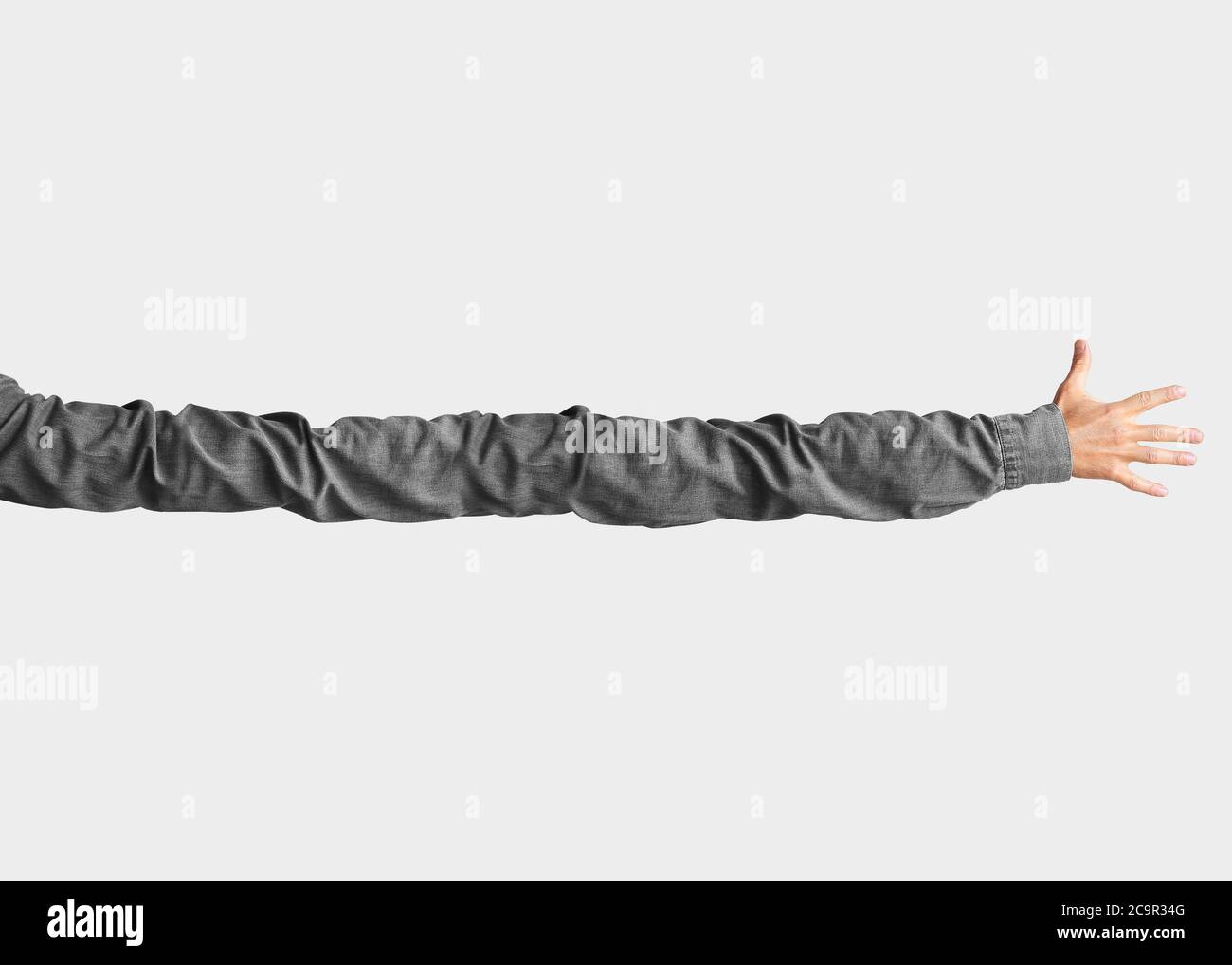 Very long arm reaching for something desirable Stock Photo - Alamy