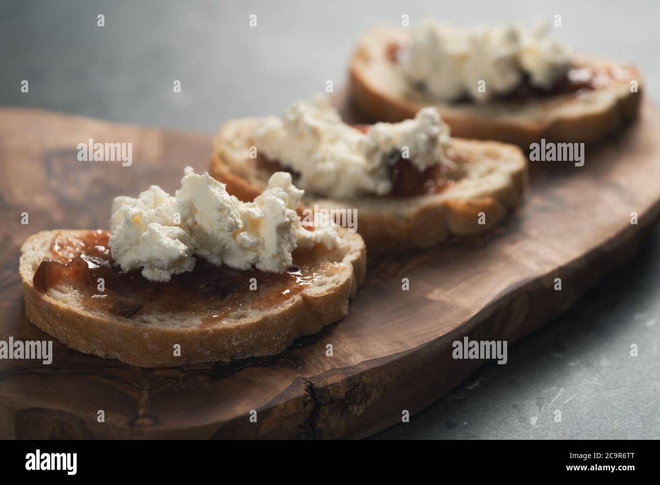 Bruschetta with ricotta and fig jam Stock Photo Alamy