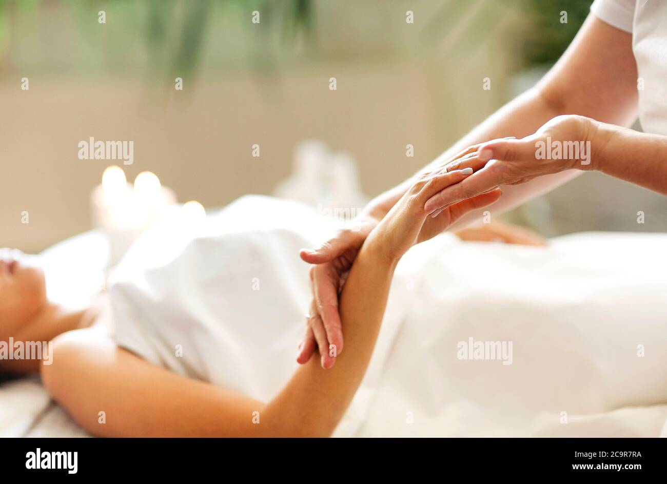 Professional massage of hands in spa salon. Close up Stock Photo