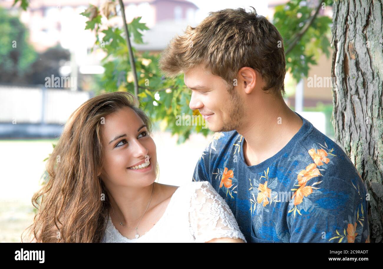 young couple has fun in the park Stock Photo - Alamy