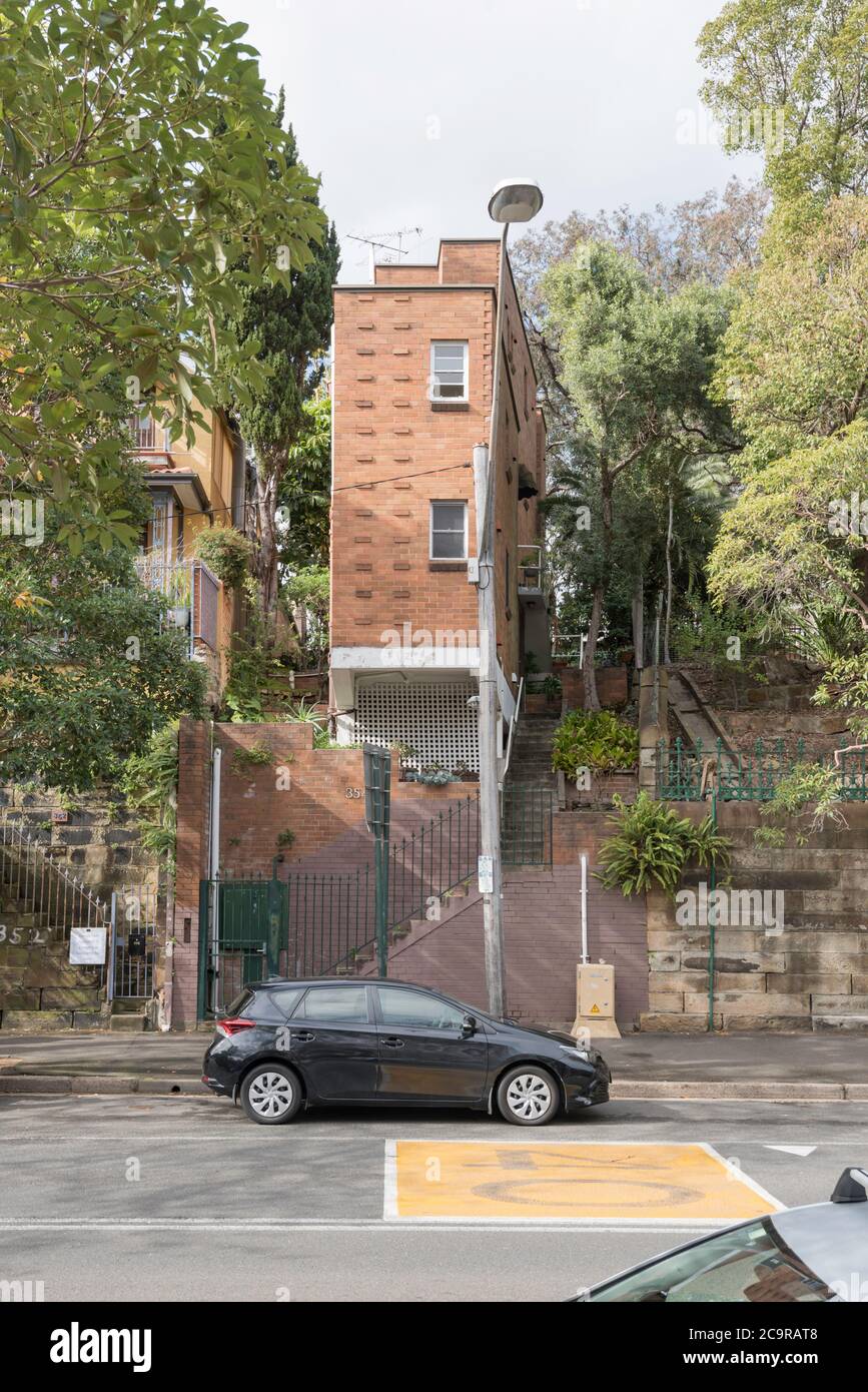 A strange narrow set of apartments built to fit the shape of the block