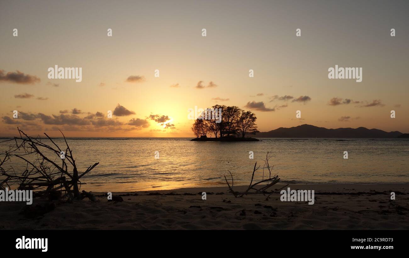 Beautiful Sunset on the Seychelles island LaDigue Stock Photo