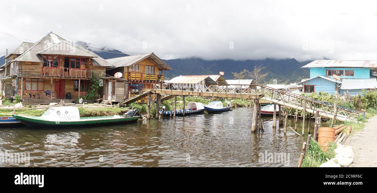 Laguna de la Cocha at El Encano with wooden briges and stilt houses near Pasto, Colombia. Stock Photo
