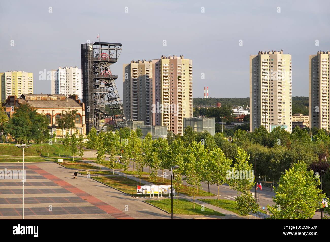 Old tower shaft Warszawa II and modern houses in Katowice. Poland Stock