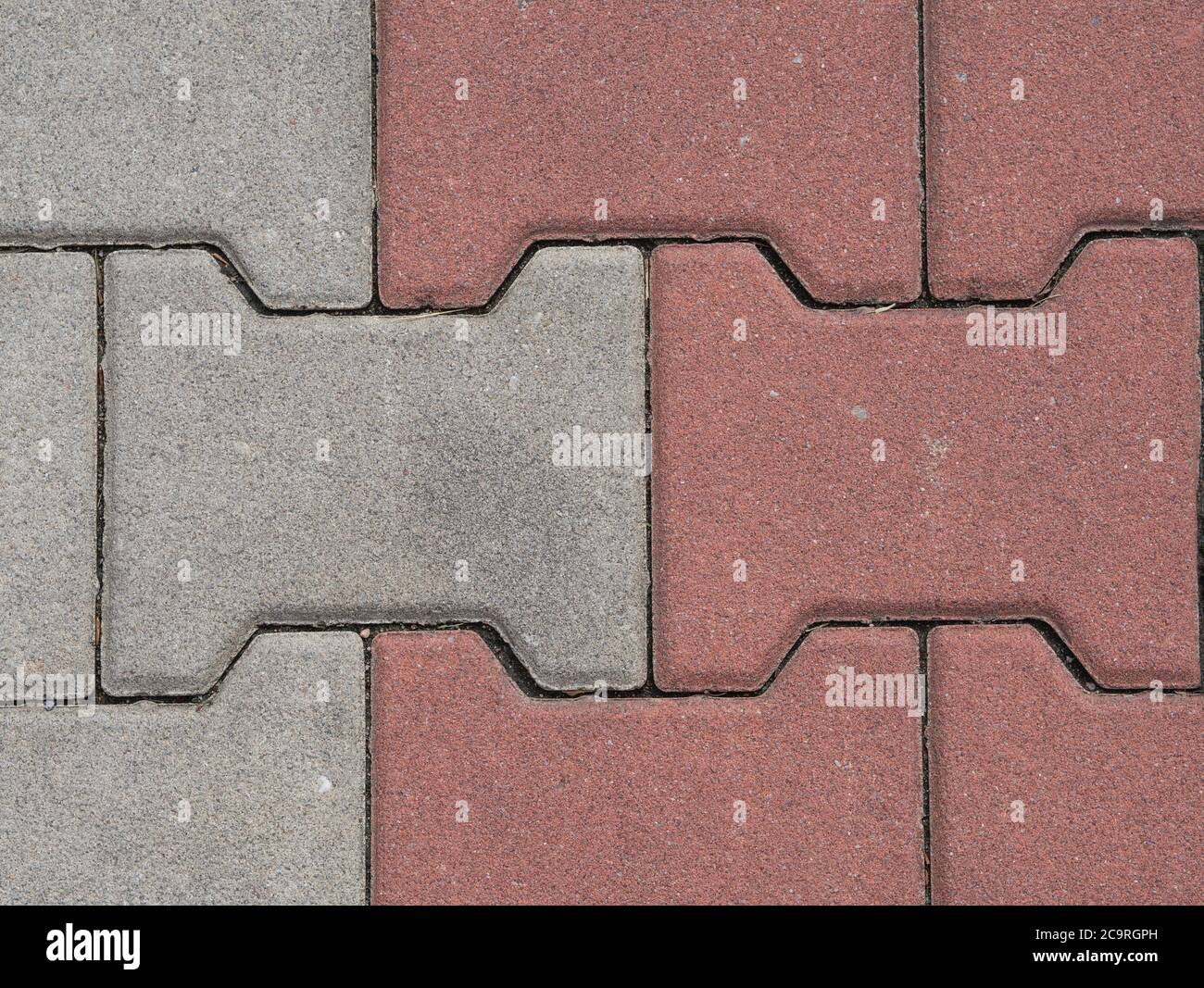 red and white interlocking pavement background Stock Photo Alamy
