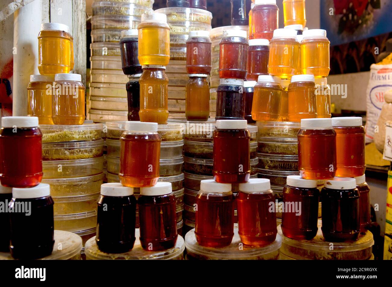 Jars of local natural honey for sale in Erbil Souk, the Kurdish region of Iraq. Stock Photo