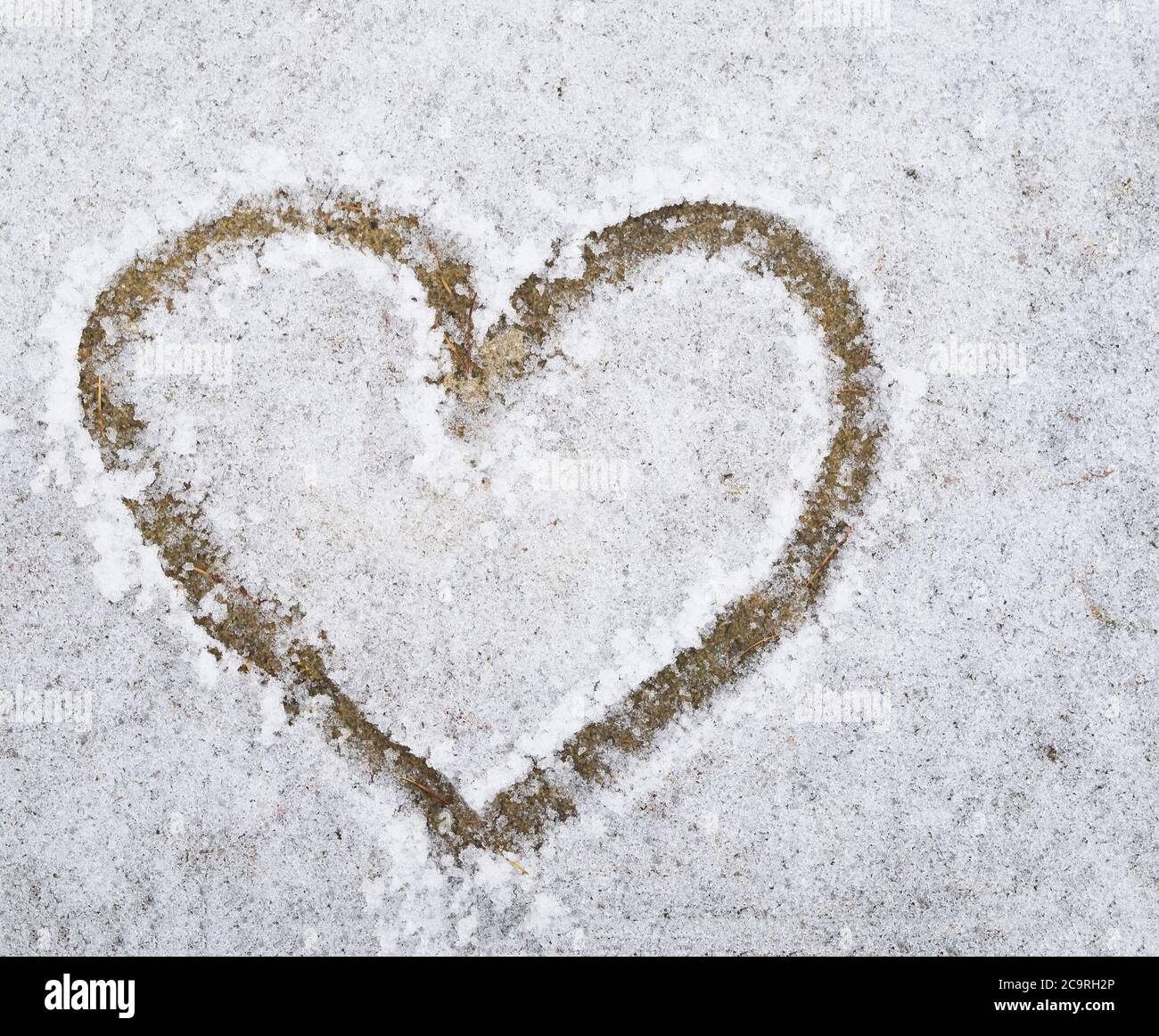 hand drawn heart shape in the snow on sandstone Stock Photo - Alamy