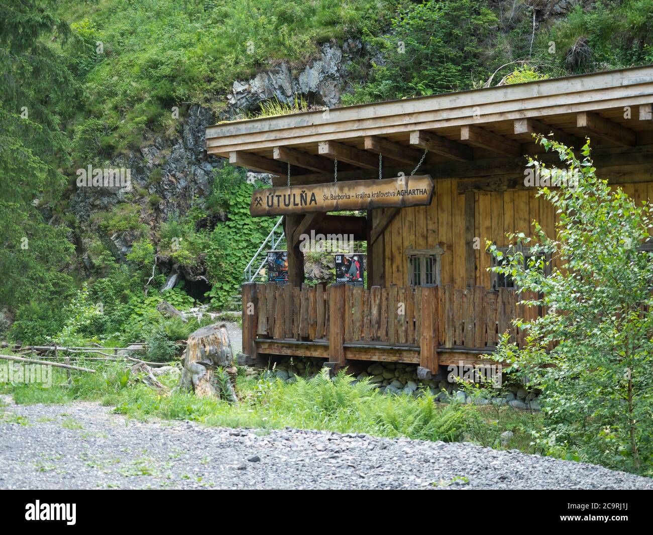 Slovakia, Western Tatra mountain, July 2, 2019:wooden shelter Barborka with rock and forest next tunnel Medvedi stola tourist attraction on ziarska Stock Photo