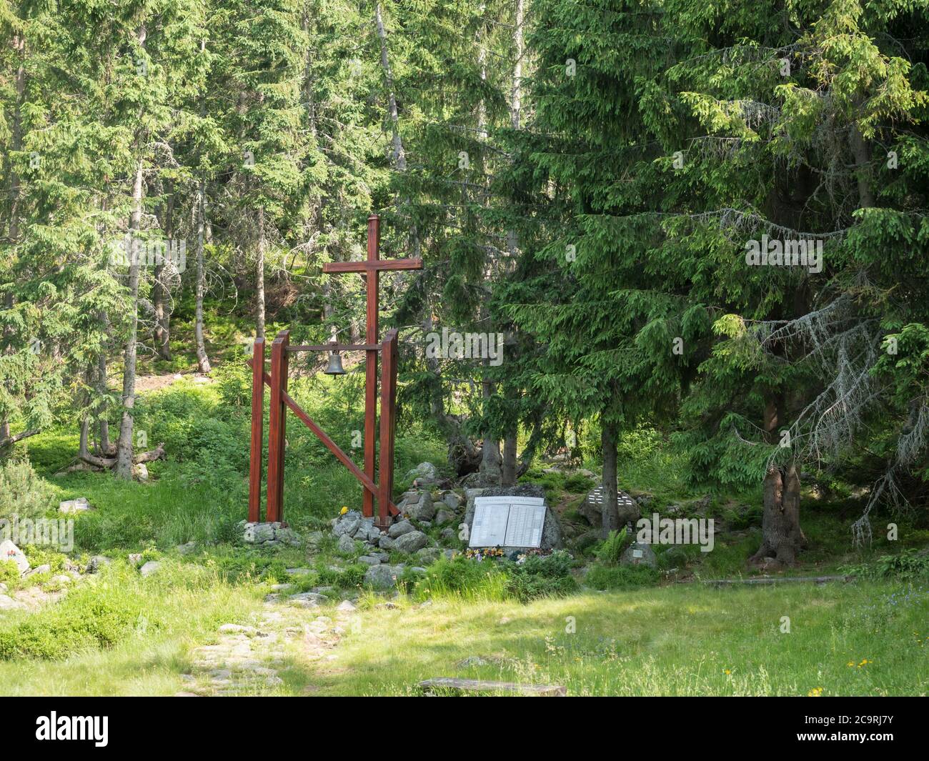Slovakia, Western Tatra mountain, July 2, 2019: Entrance to memorial to respect death climbers and hikers in tatra mountains.garden with cross and Stock Photo