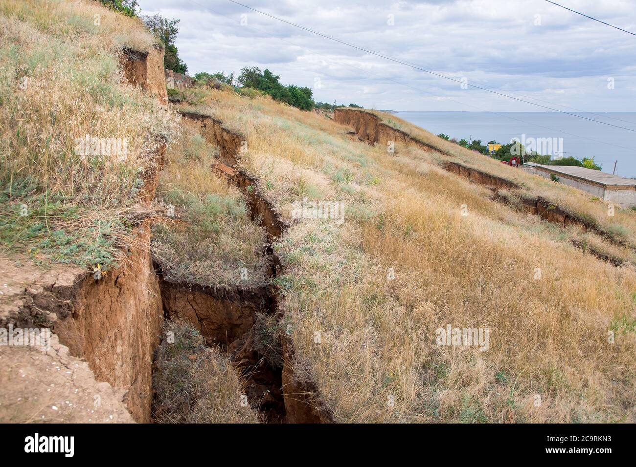 landslide in an environmentally hazardous area slopes on the coast ...
