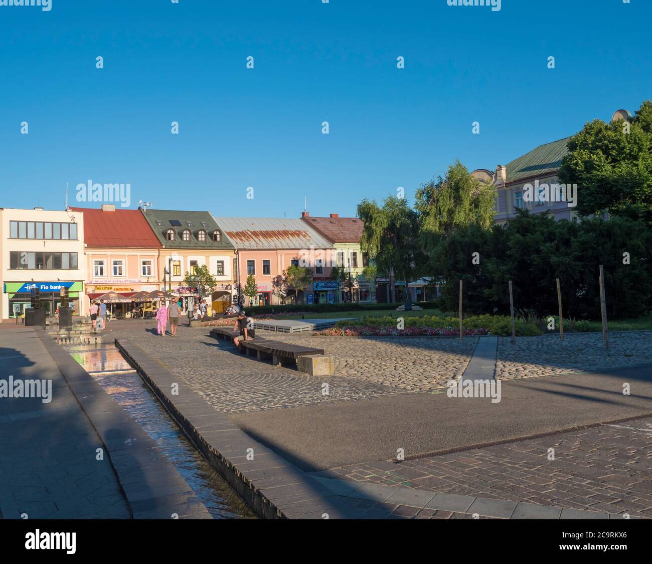 LIPTOVSKY MIKULAS, LIPTOV, SLOVAKIA, July 4, 2019: View to the main square with park and buildings in the city center of Liptovsky Mikulas town with Stock Photo