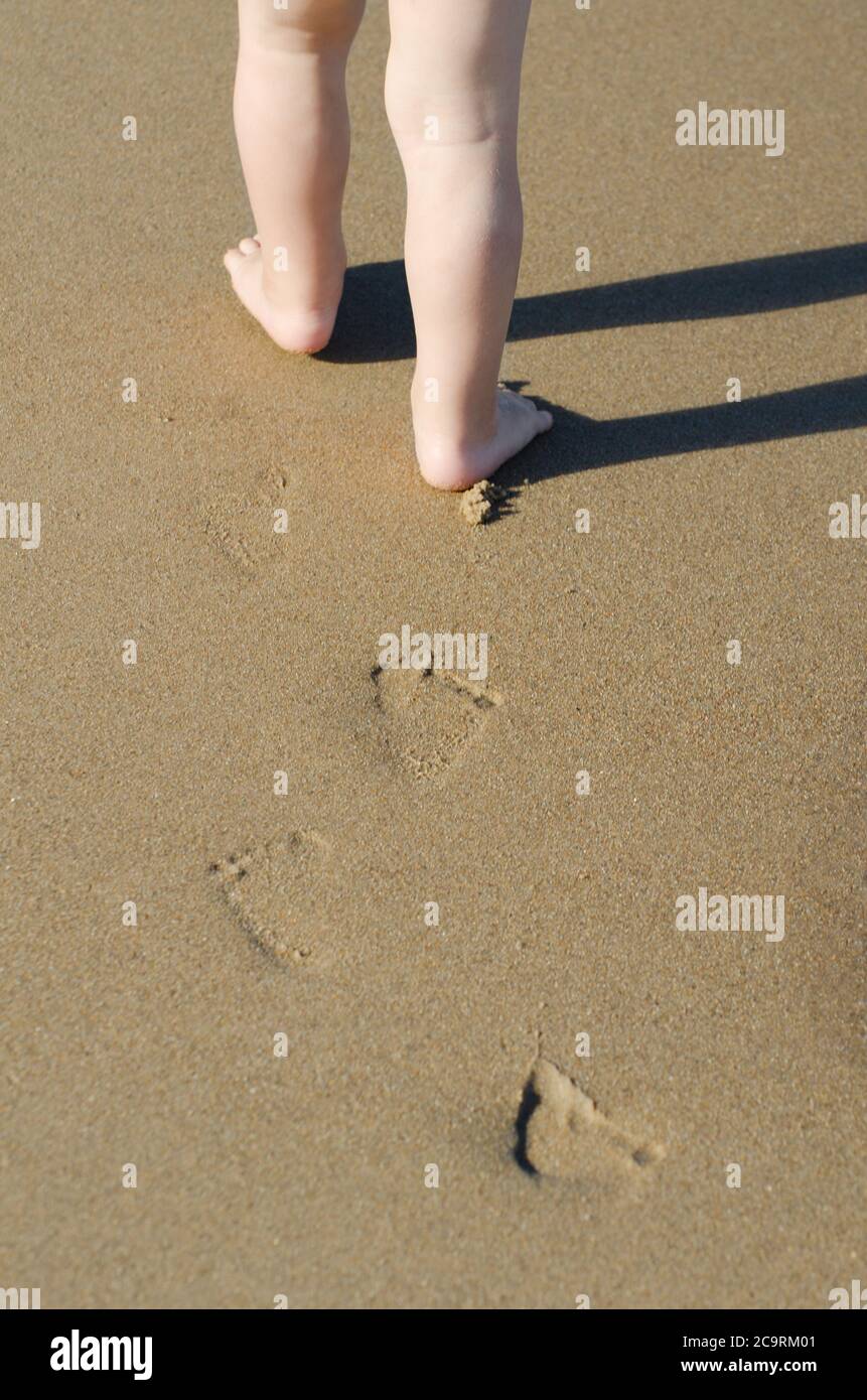 baby footprints in sand