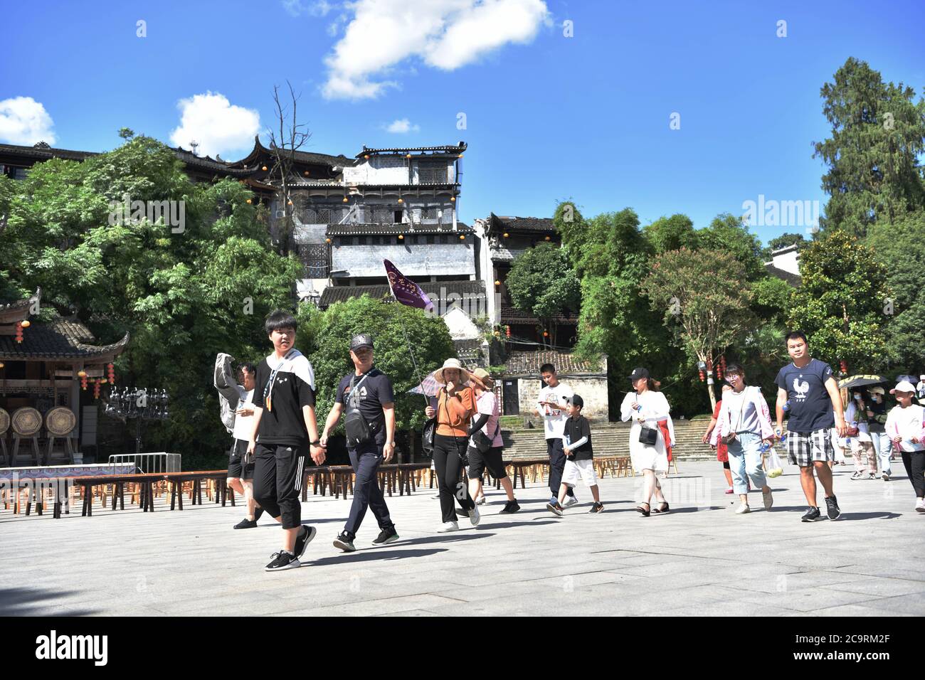 (200802) -- YONGSHUN, Aug. 2, 2020 (Xinhua) -- Tourists enjoy leisure time at the Furong Town scenic spot in Yongshun County, central China's Hunan Province, Aug. 2, 2020. With epidemic prevention measures in place, the scenic spot has seen an increase of tourists during the summer vacation, with an average of nearly 4000 visitors per day. (Xinhua/Chen Sihan) Stock Photo