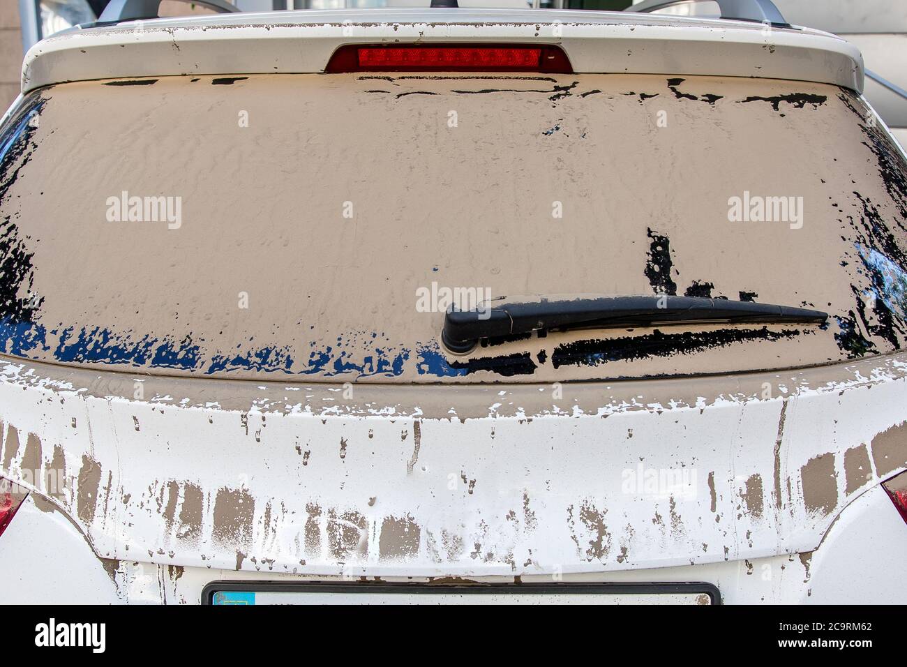 the dust windscreen of dirty car back view Stock Photo Alamy