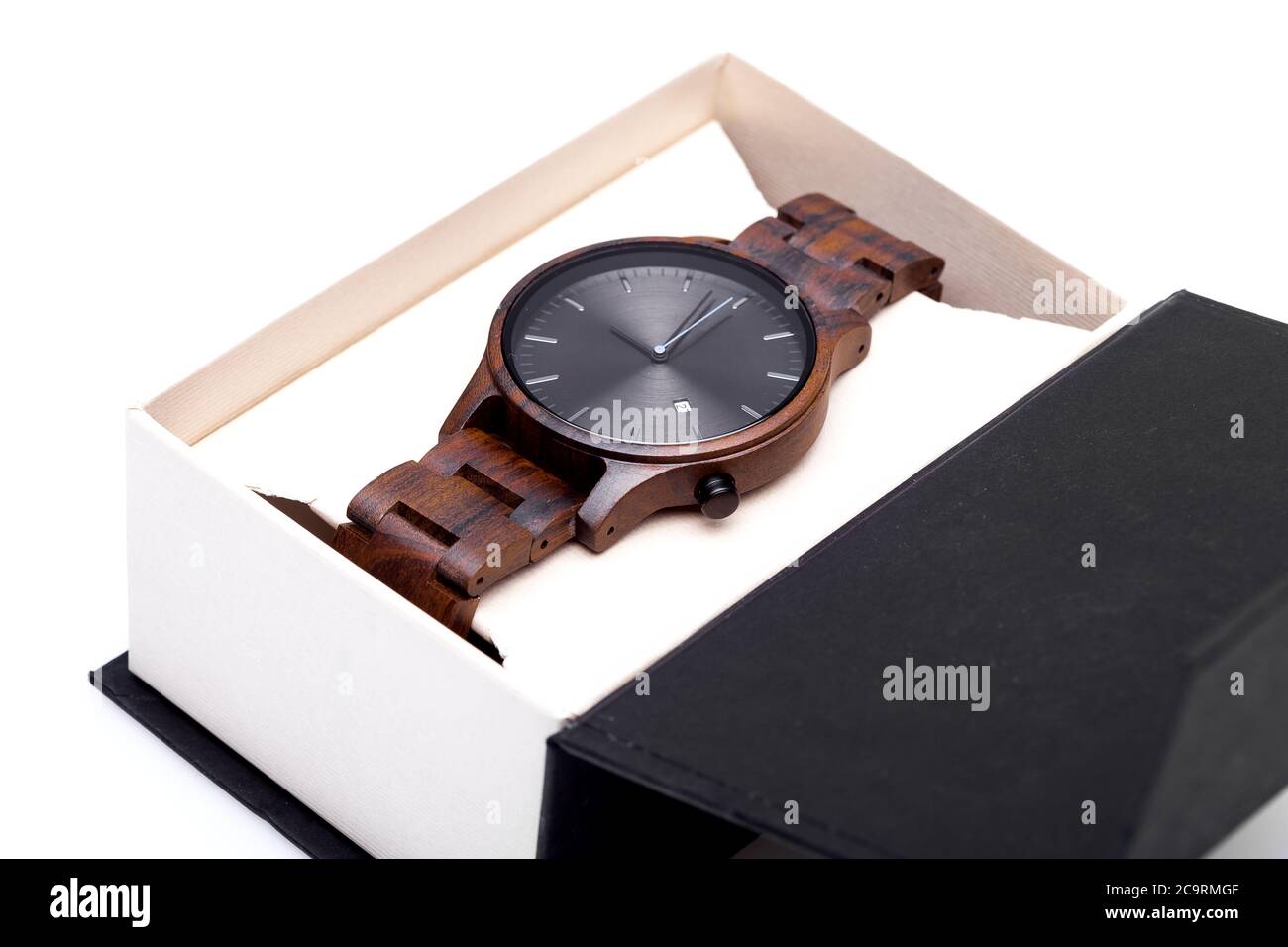 wooden wrist watch with a bracelet and a round dial packed in a