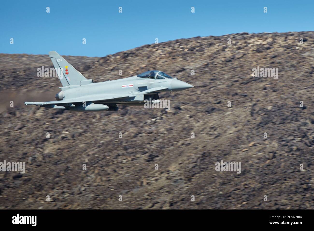 Royal Air Force Eurofighter Typhoon FGR4, Jet Fighter, Flying At Low Level And High Speed Through Rainbow Canyon, California, USA. Stock Photo
