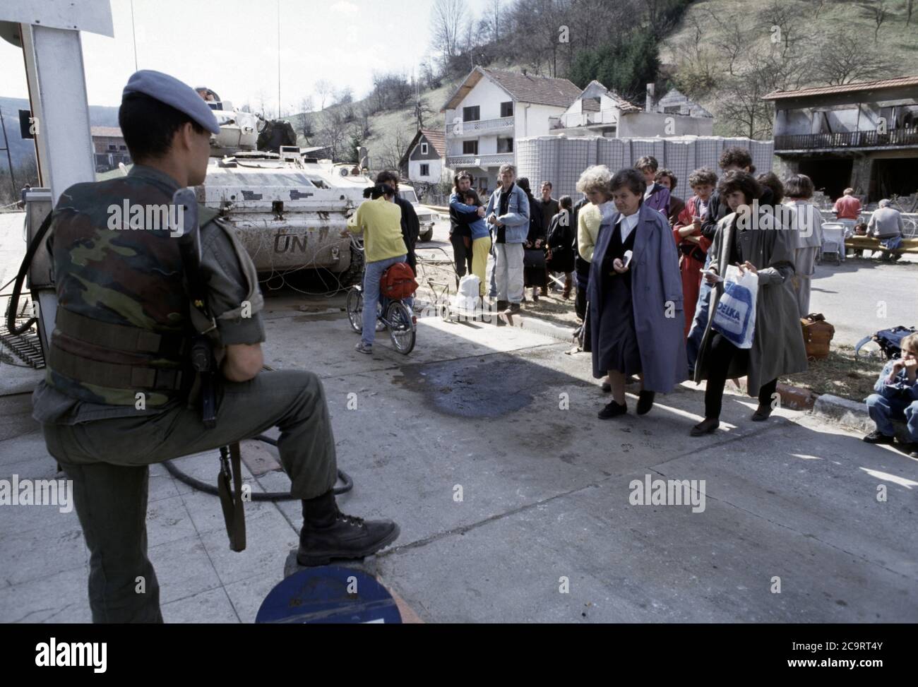 26th March 1994 During the war in Bosnia: a group of Muslim women have just arrived by bus at a joint Bosnian Croat/Bosnian Muslim/UN checkpoint, set up a few kilometres south-east of Vitez under the recent agreement that the warring factions dismantle their unilateral checkpoints. Stock Photo