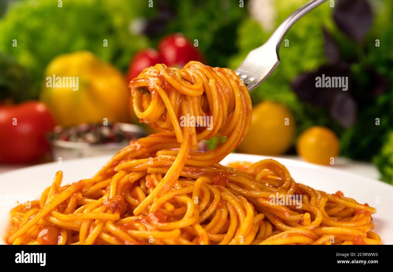 Italian pasta bolognese, spaghetti with tomato ketchup on fork Stock ...