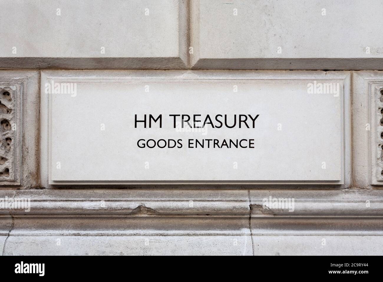 A HM Treasury sign on the British Government Treasury building in London, England Stock Photo