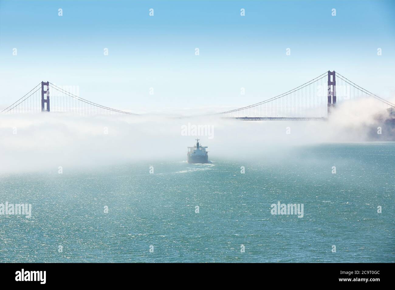 An Oil Tanker (Crude Oil Tanker), Enters A Bank Of Sea Fog As She Departs The San Francisco Bay For The Pacific Ocean Stock Photo