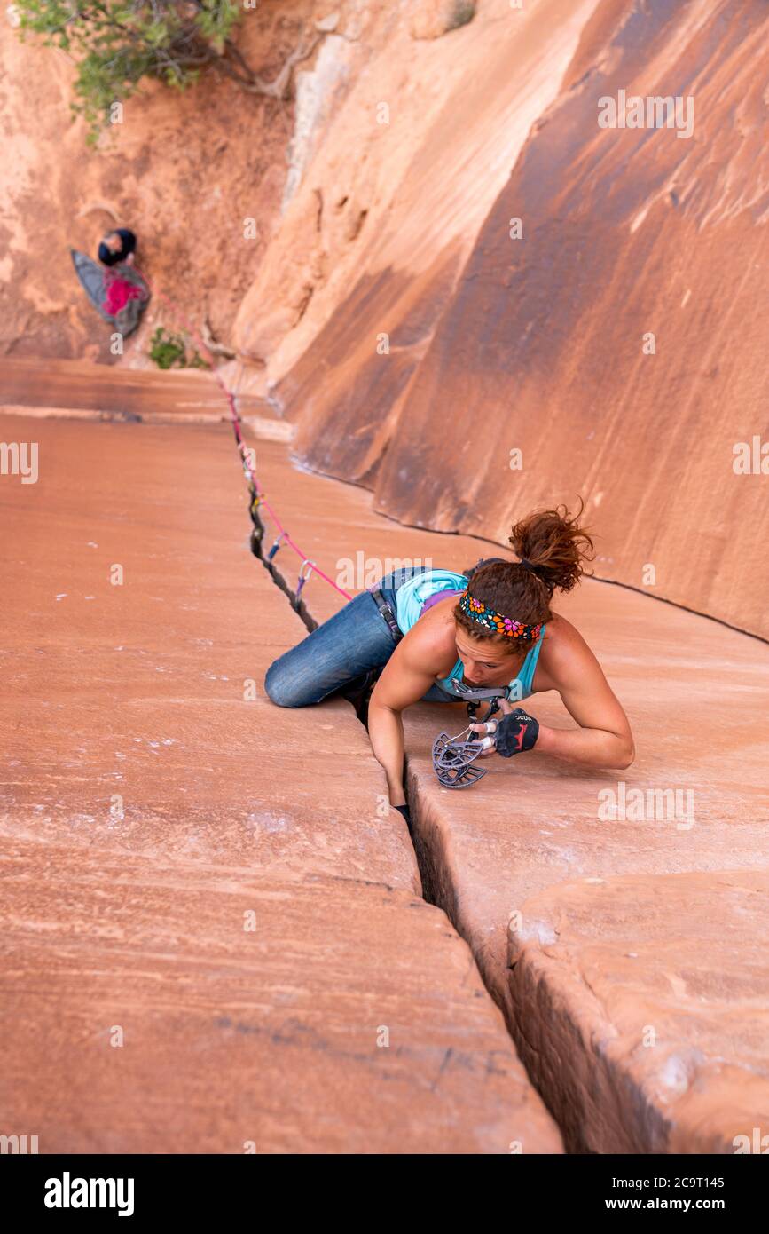 Woman Rock Climbing Stock Photo - Alamy