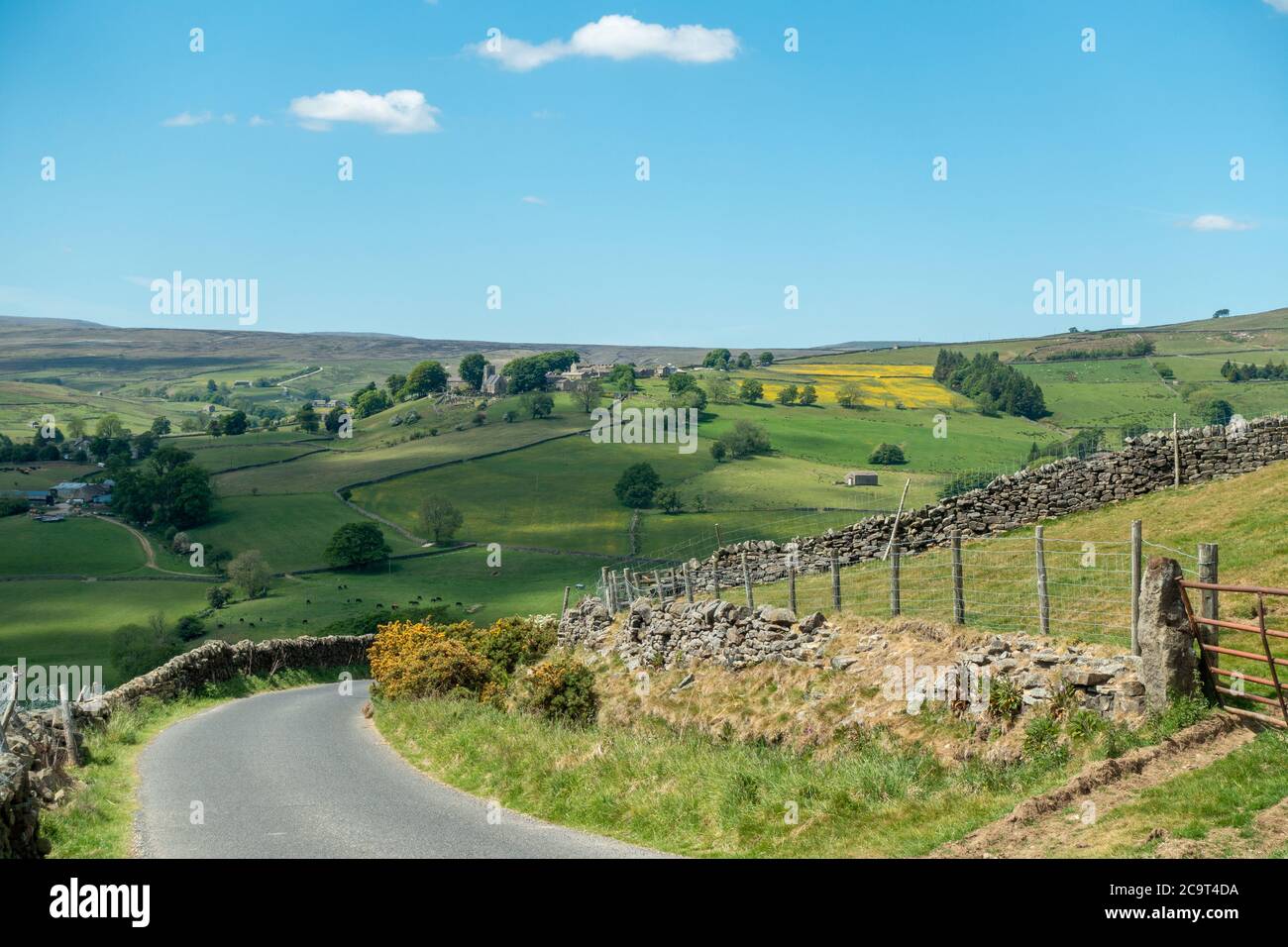 Looking down Trapping Hill in Nidderdale and across to the village of Middlesmoor, North Yorkshire, England, uk Stock Photo