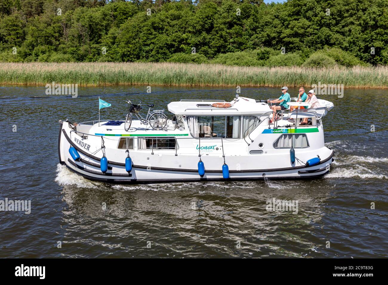 Locaboat houseboat WERDER on the river Elde in the Mecklenburg Lake