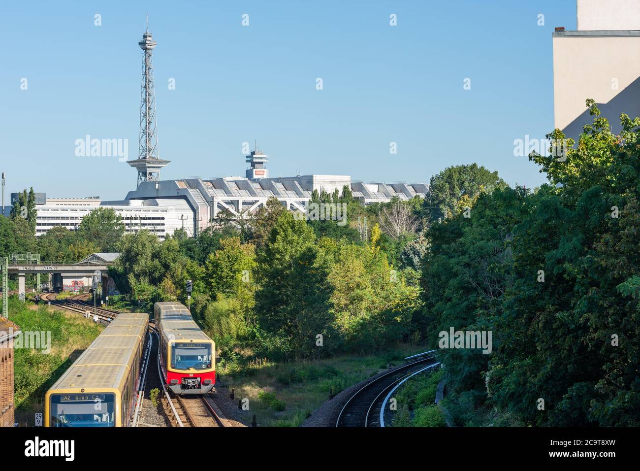Berlin radio tower with ICC and a moving S-Bahn in landscape format Stock Photo