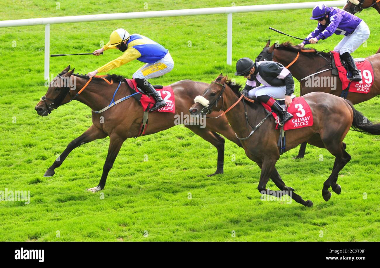 Darkened ridden by Joey Sheridan (left) wins The Ardilaun Hotel Handicap during day seven of the 2020 Galway Races Summer Festival at Galway Racecourse. Stock Photo