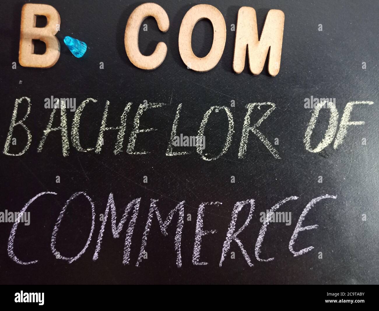 B Com Bachelor Of Commerce Educational Course Name Visible On Chalkboard With Wooden Art Frame Style Stock Photo Alamy