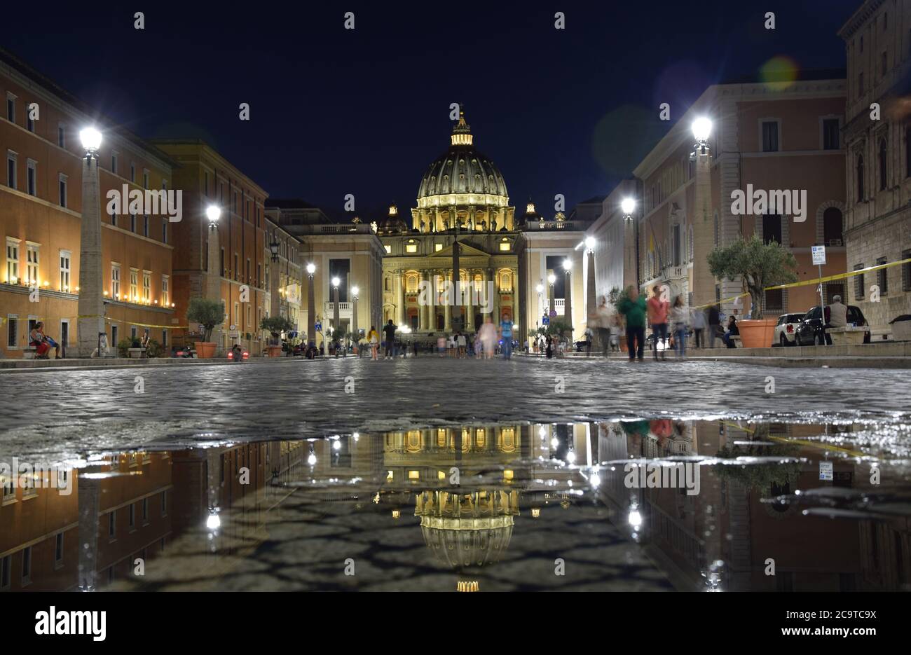 St. Peter's Basilica on St. Peter's Square by night in the city of Rome, Italy Stock Photo